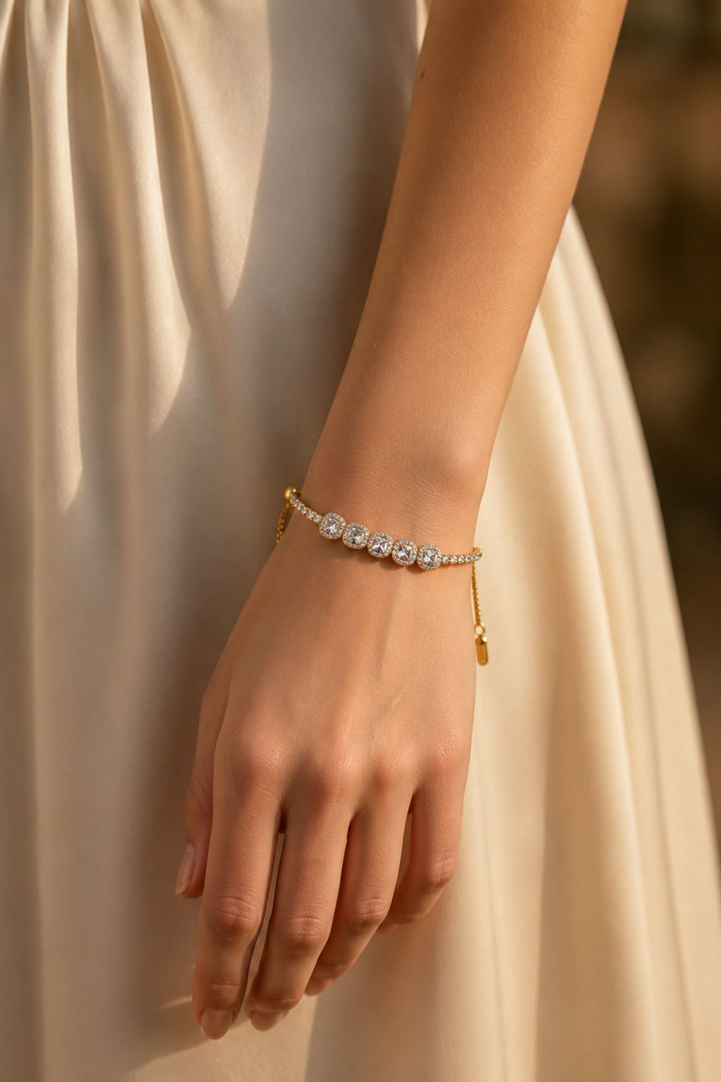Gold-Plated Oval-Cut Diamond-Studded Tennis Bracelet.