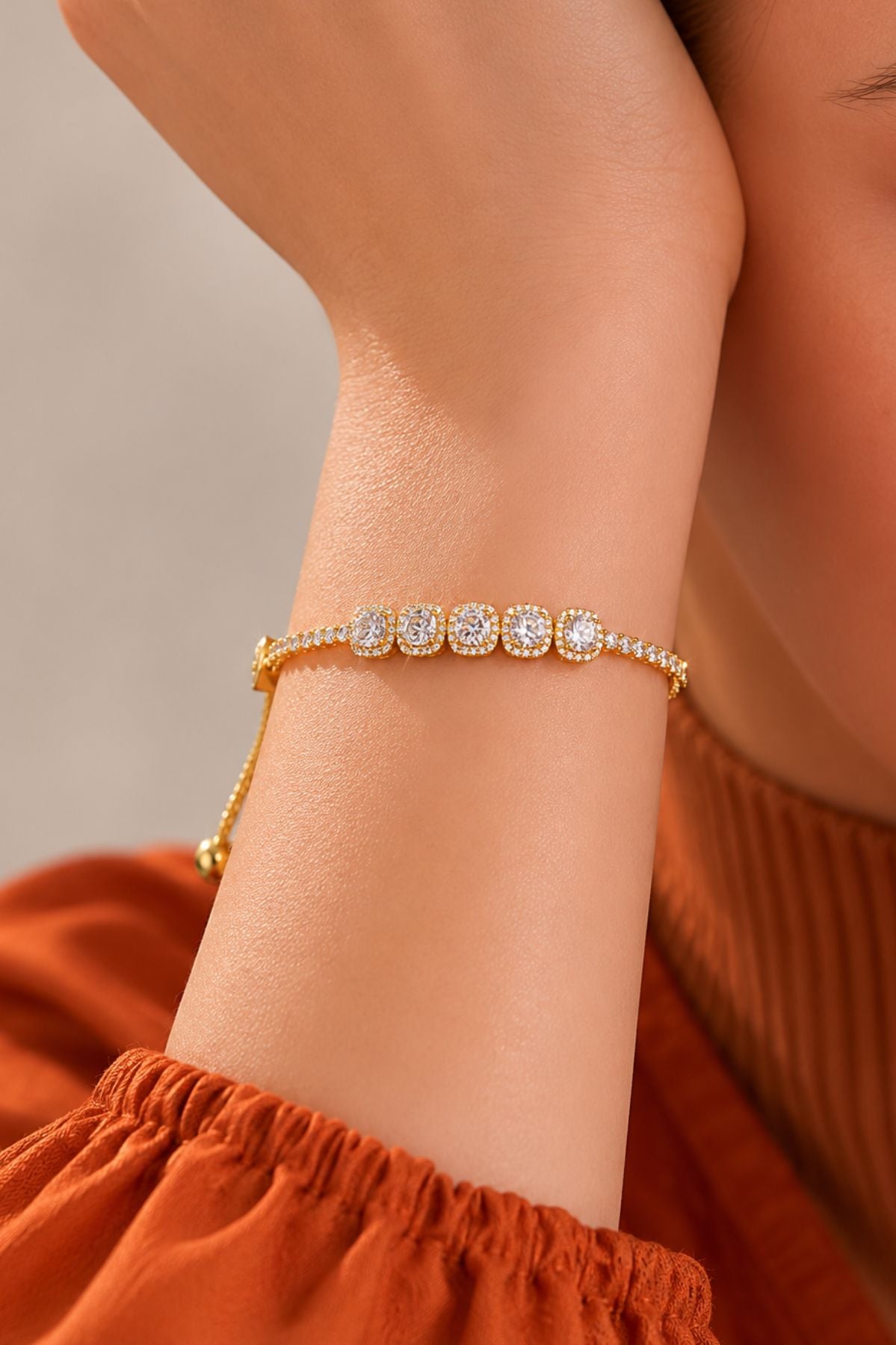 Gold-Plated Oval-Cut Diamond-Studded Tennis Bracelet.