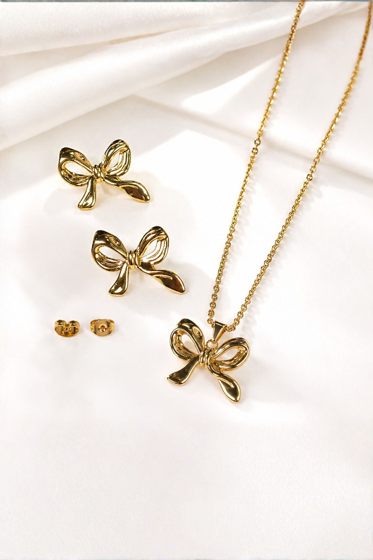 Gold Bow Pendant Necklace & Earrings Set