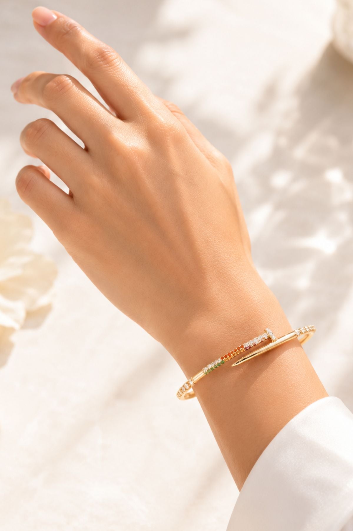 Gold-Toned Crystal Nail Design Bracelet