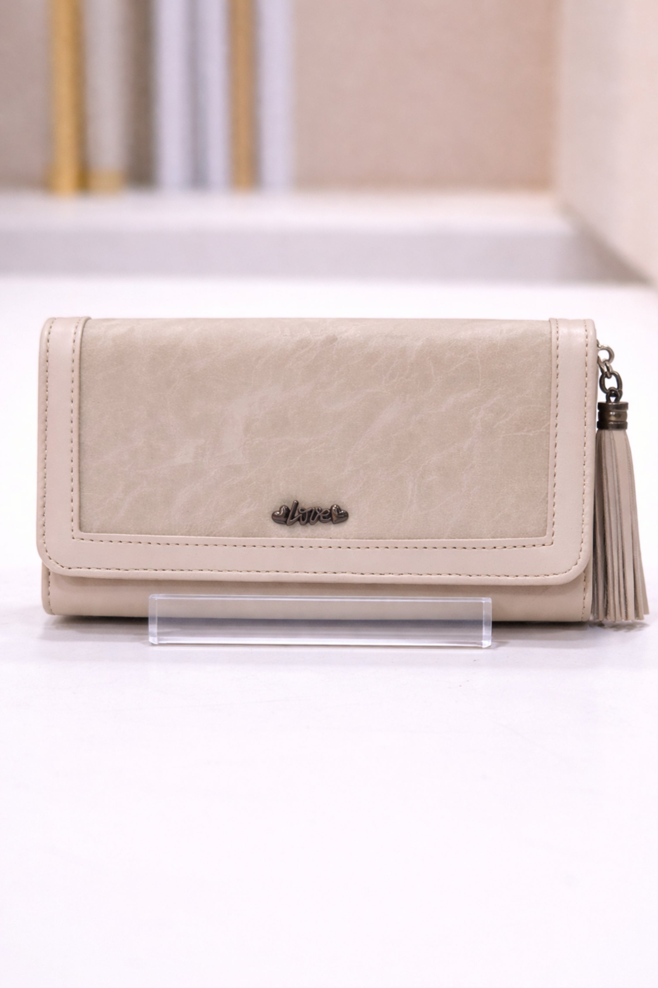 Women Beige Textured Flap Wallet with Tassel Detail