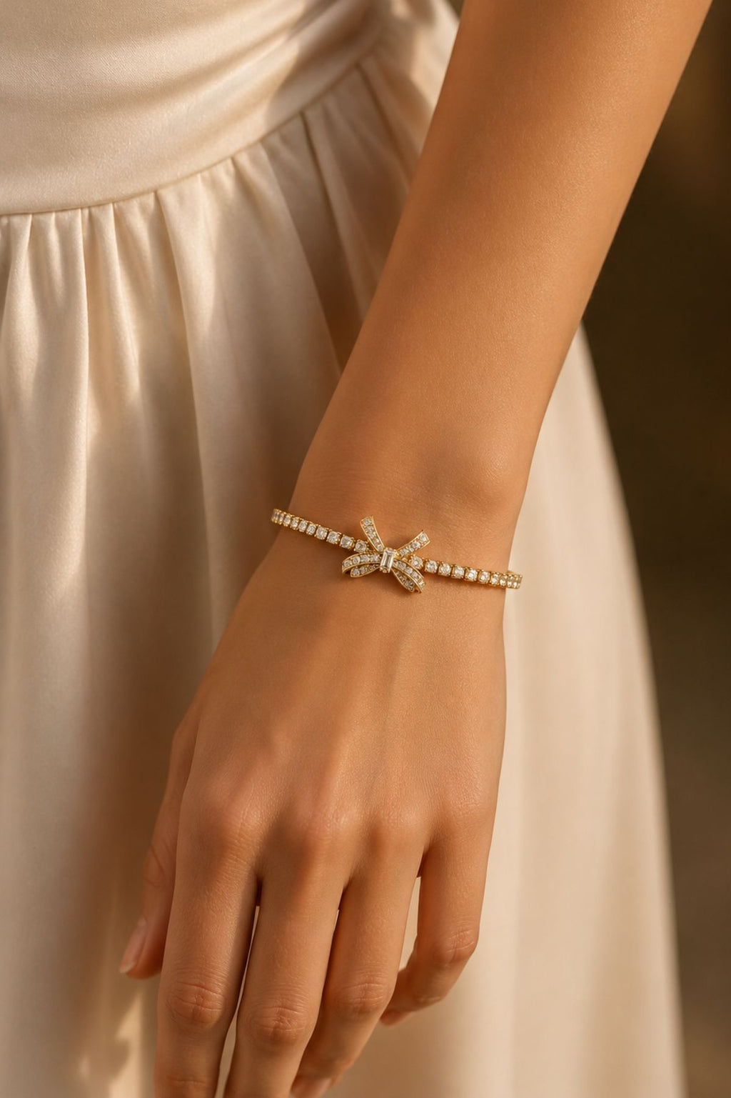 Gold-Plated Bow Charm Tennis Bracelet