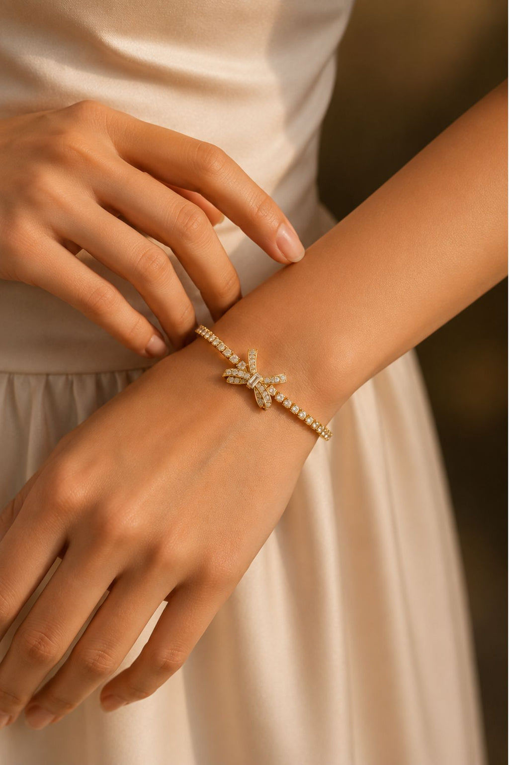 Gold-Plated Bow Charm Tennis Bracelet