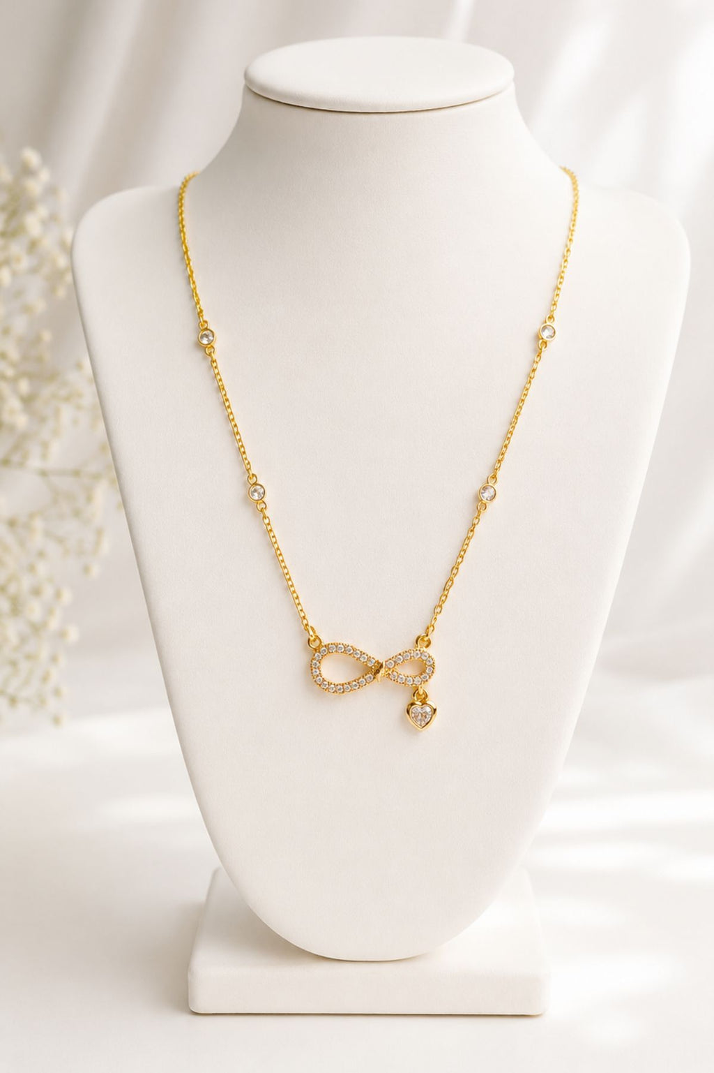 Necklace with Crystal-Studded Infinity Pendant